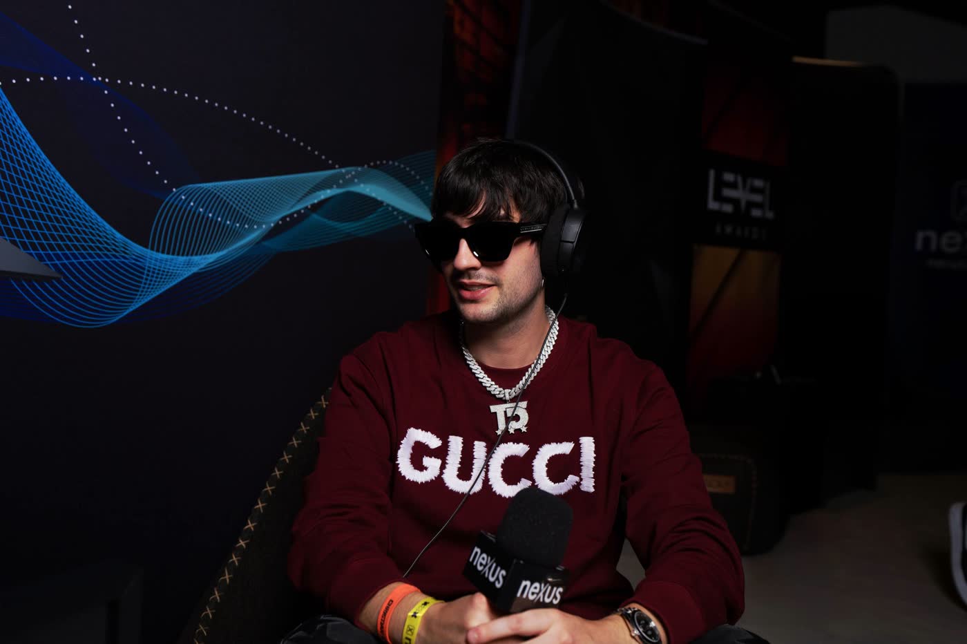 Thomas Deil with headphones and a Nexus Radio microphone on the MSI interview set